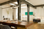 Comedor de estilo industrial con columnas de hierro