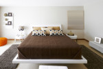 Dormitorio moderno de tonos marrón