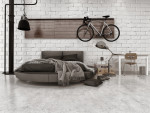 Dormitorio de estilo industrial con ladrillo visto