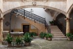 Terraza clásica con escalinata